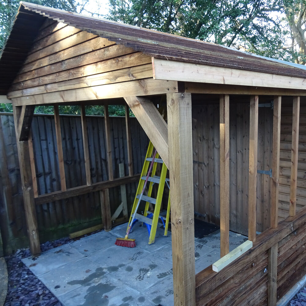 Timber lean-to and log store
