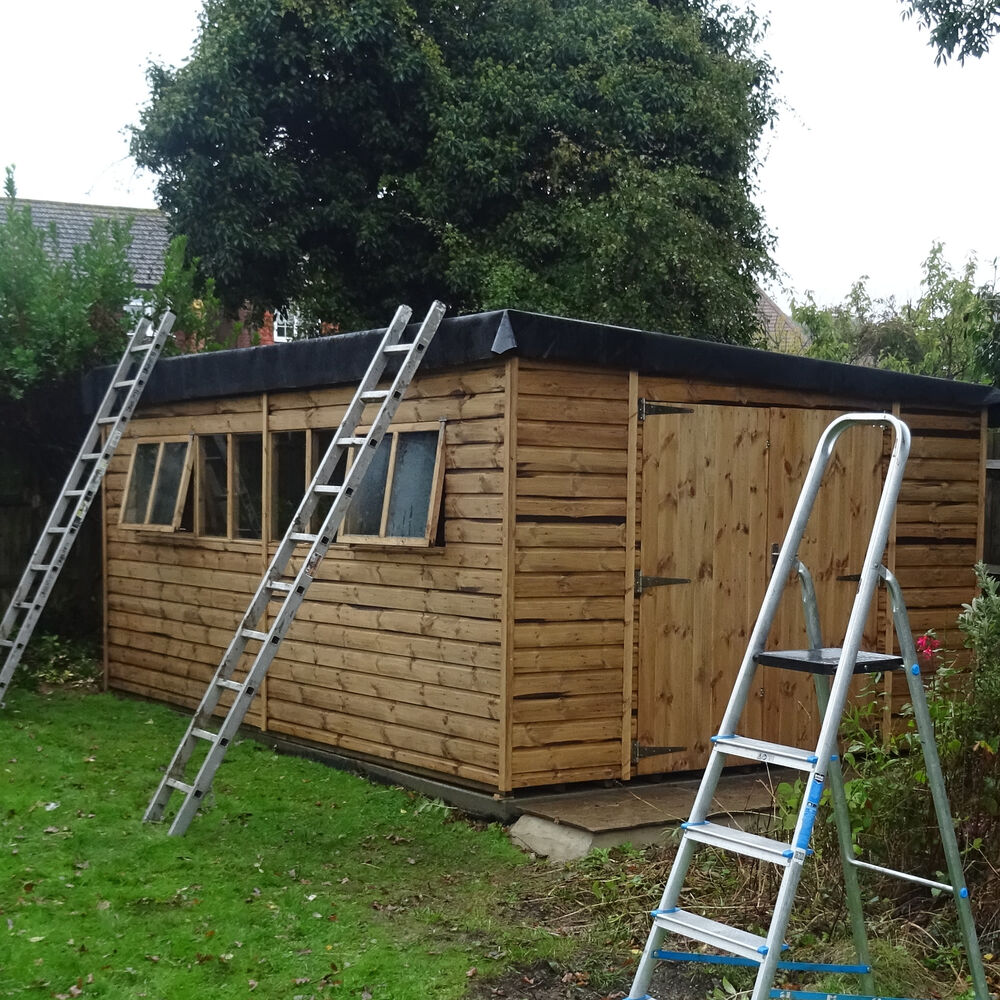 New garden shed installed on a freshly laid base